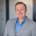 Dr. Craig Layt in suit
